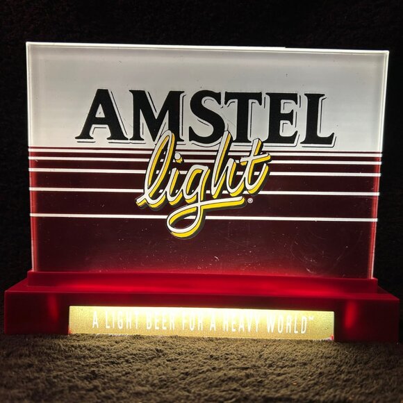 Vintage Lighted Plastic Amstel Light "A Light Beer for a Heavy World" Sign - Picture 1 of 7